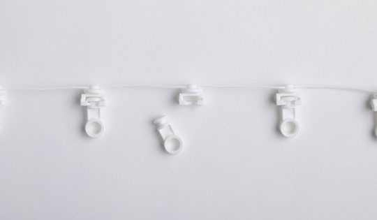 CORREDERA (CARRIER) DESPRENDIBLE DE FRICCION RIPPLEFOLD (SISTEMA ONDULADO)